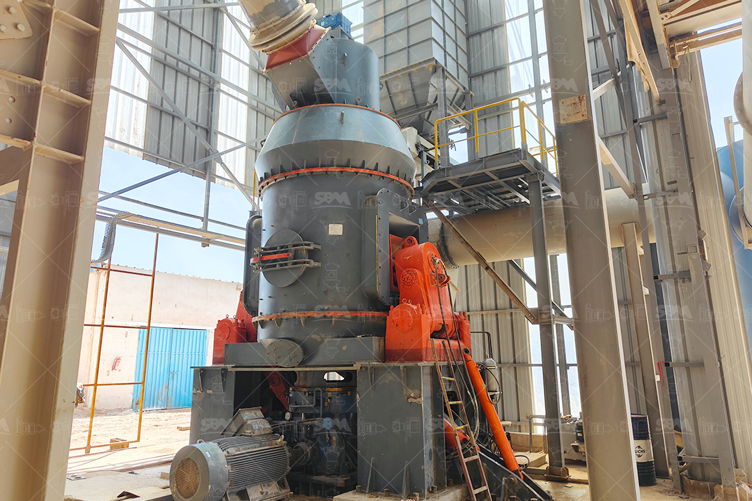 Diagram of a vertical roller mill for slag processing showing grinding rollers and table